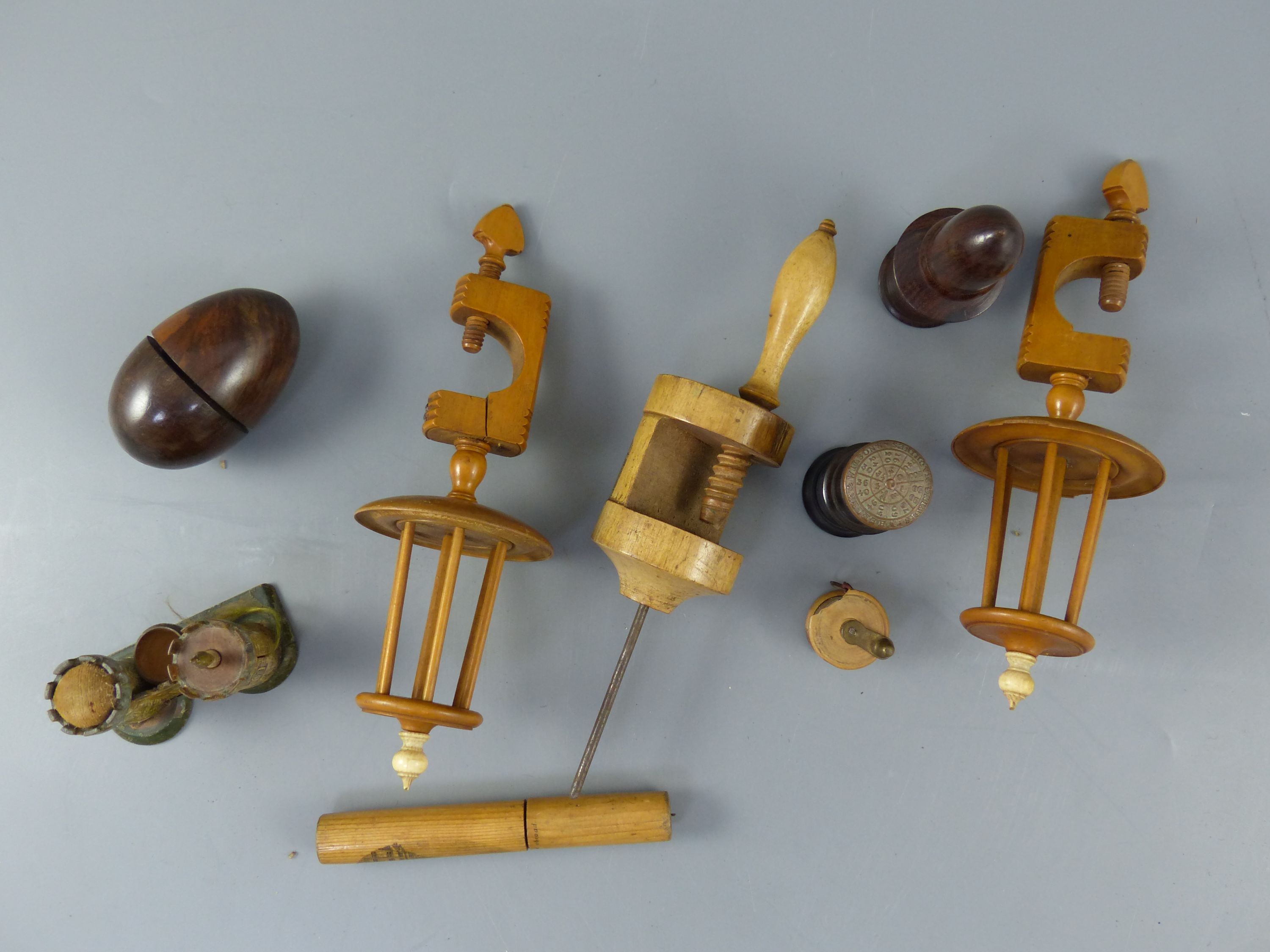 A group of Victorian treen sewing accessories